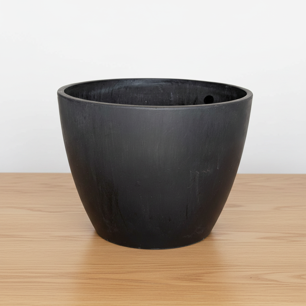 Black planter pot on a white background