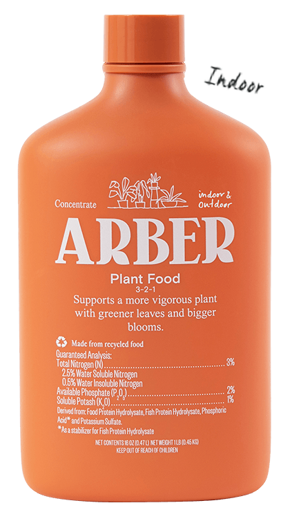 Orange 16oz Arber Plant Food bottle with "Indoor & Outdoor" text and plant illustrations.